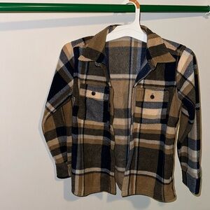 Long sleeved fleece material button down shirt.